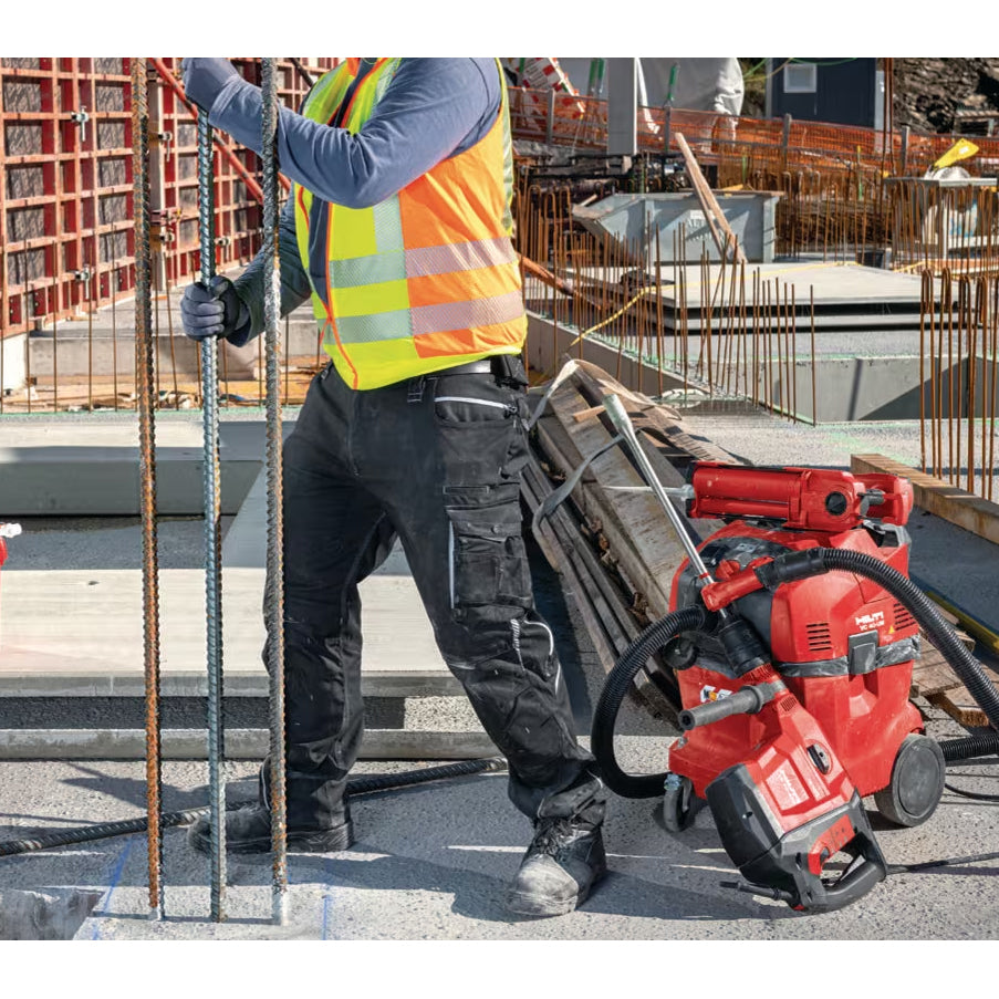 man securing rebar vertiacally with hilti's hy 200-a anchoring adhesive