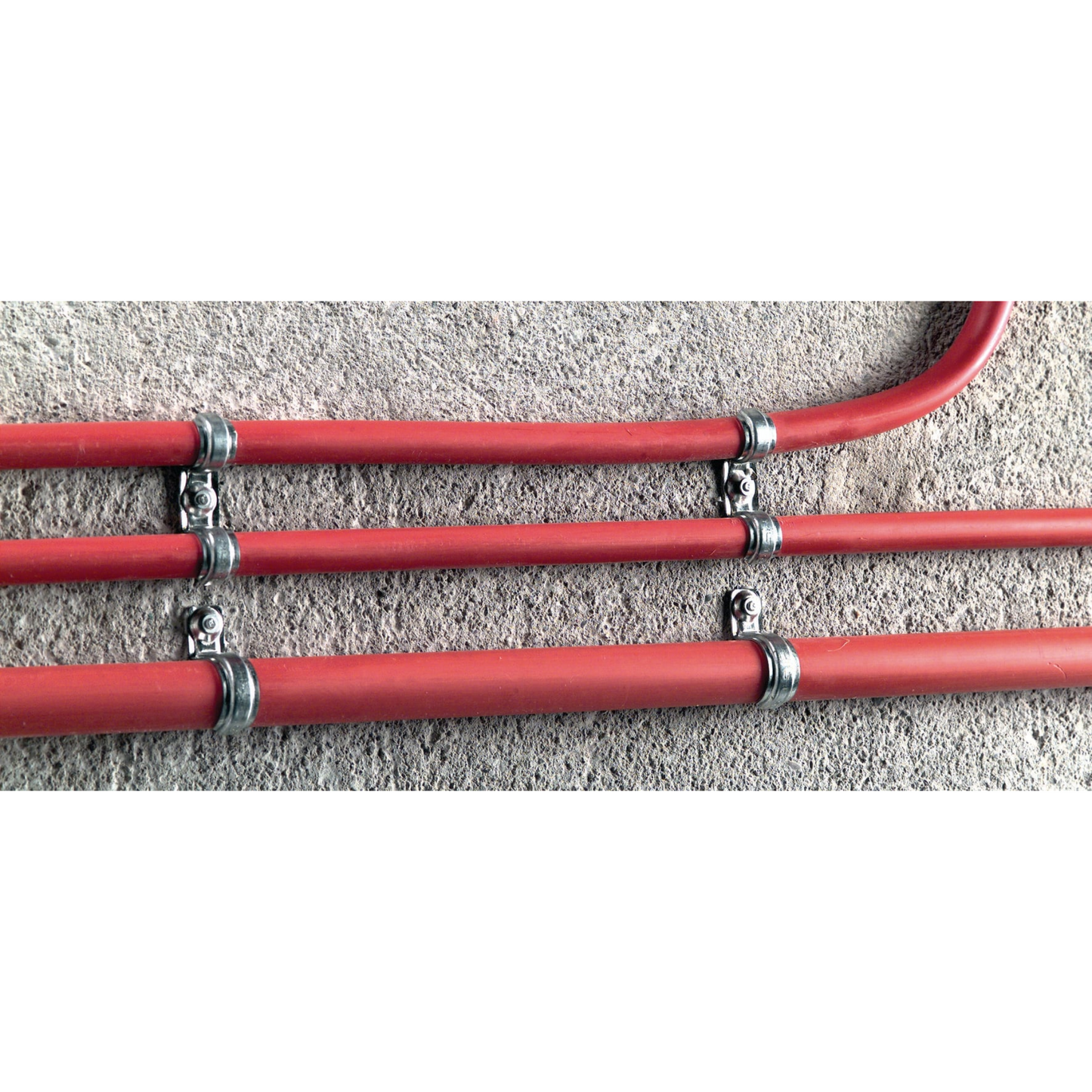 hilti's 1/4" x 1-1/4" masonry screw anchor holding metal bracket around water pipe on concrete wall