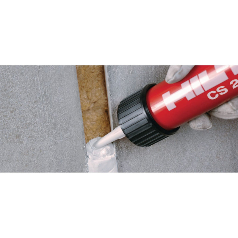 Hilti acrylic firestop caulk being applied between wall panels