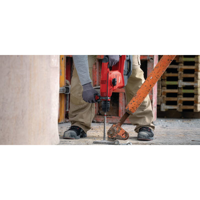 man using hilti masonry drill bit TE-CX 1/4" x 6" to secure support into concrete