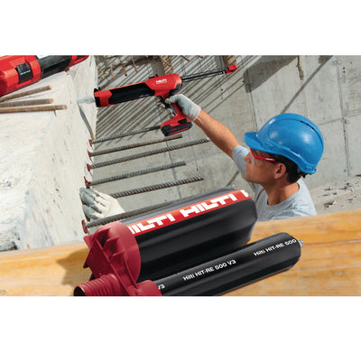hilti hit-re 500 chemical anchor being applied for rebar in concrete wall