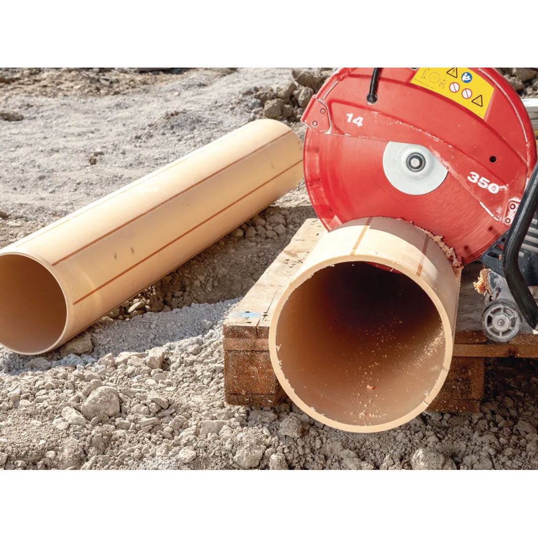 hilti's gas cut-off saw being used to cut plastic pipe