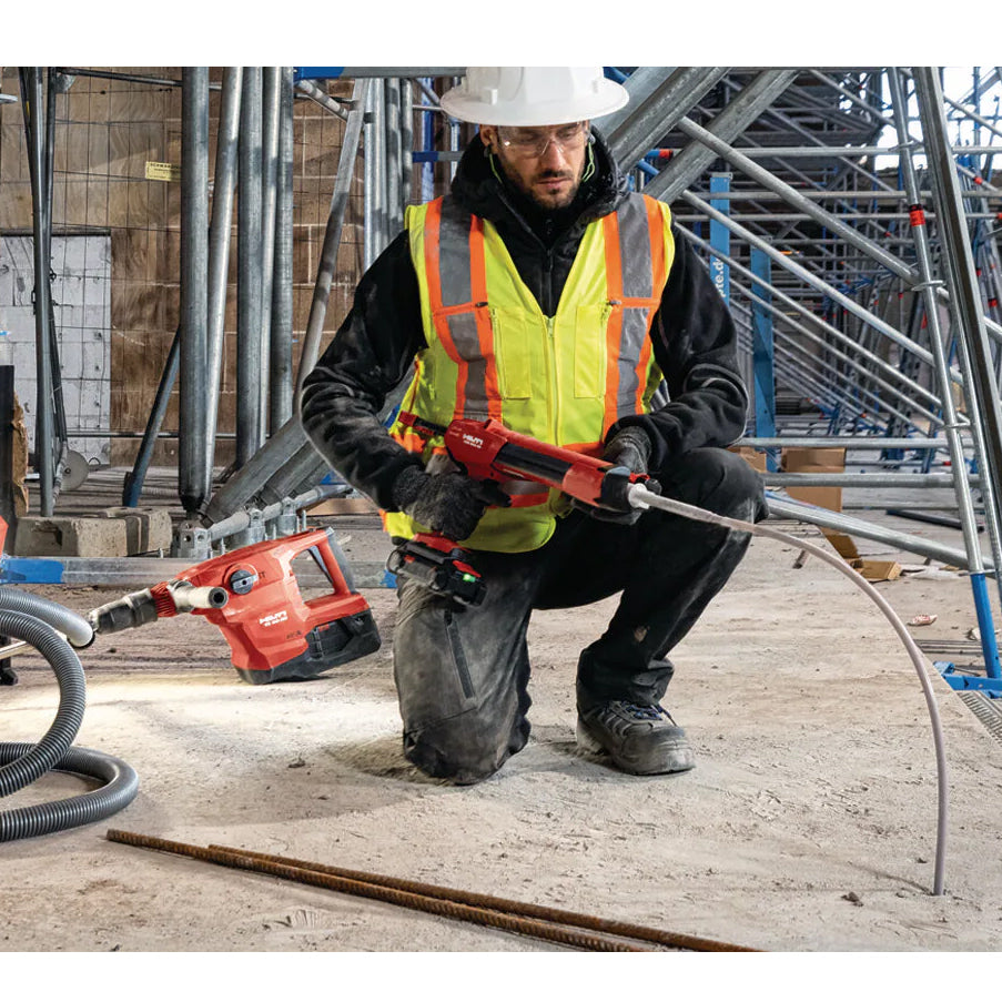 man applying hilti's hy 200-a anchoring adhesive for rebar in concrete