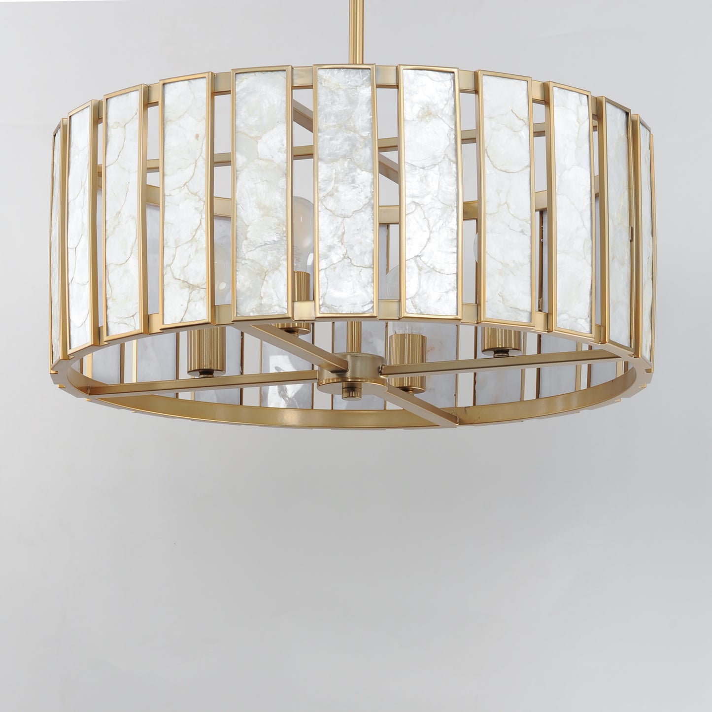 12804CZNAB - 4 Light Miramar 24" Pendant - Capiz / Natural Aged Brass