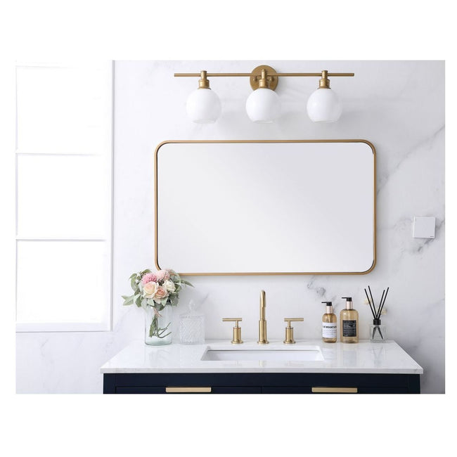 MR802236BR Evermore 22" x 36" Metal Framed Rectangular Mirror in Brass